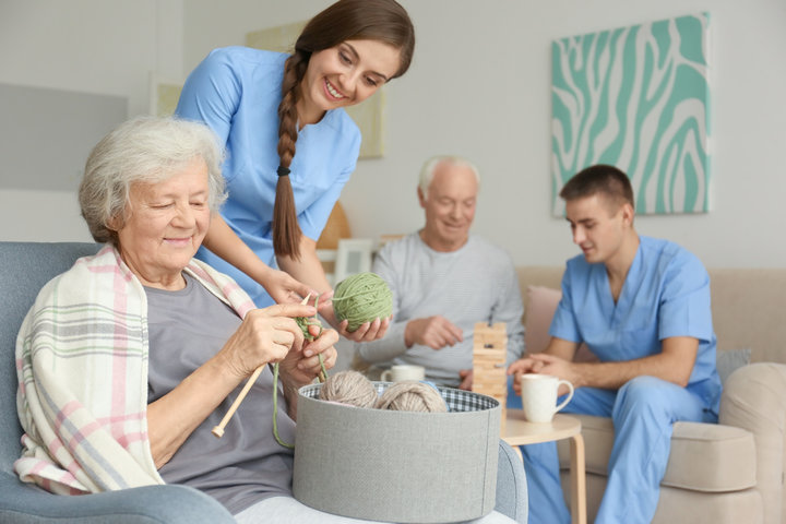 residents enjoying knitting in a care home